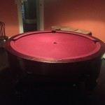 A round pool table.